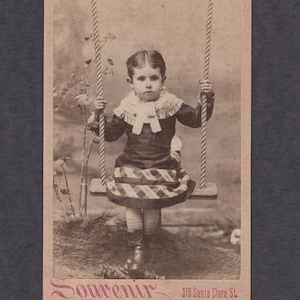 CDV of a Well-Dressed Little Girl on a Swing