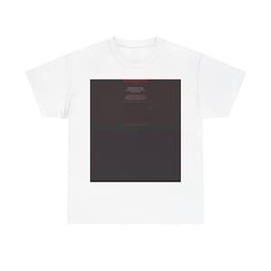 May include: A white short-sleeved t-shirt featuring a large, centered black rectangular graphic. The graphic contains small, red, and white text at the top, with the remaining area being a solid, dark, textured black block.