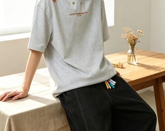 タイポグラフィTシャツ、ゆったりとしたアメリカンストリートウェア、プラスサイズカジュアルTシャツ、男性へのギフト