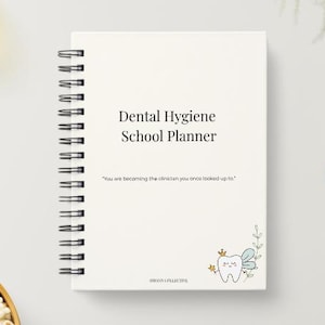 May include: A white spiral-bound planner with black text reading Dental Hygiene School Planner and You are becoming the clinician you once looked up to. A small illustration of a tooth with wings, a crown, and a wand sits in the bottom corner.