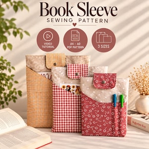 May include: Three fabric book sleeves in varying sizes, each featuring a flap with a snap closure. The sleeves display patterns including orange gingham, red gingham, and a red floral print with white polka dot accents and two pen slots.