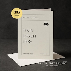 May include: A folded off-white greeting card mockup with a matching envelope. The card features black text that reads PSD - SMART OBJECT, YOUR DESIGN HERE, ADOBE PHOTOSHOP | PHOTOPEA, and READY EDIT MOCKUP STUDIO, with a black starburst icon.