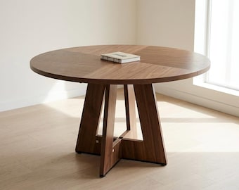 Round dining table, made of walnut wood. Seats 4-6. 120cm