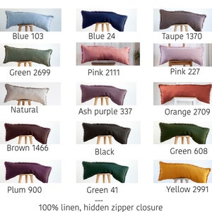 May include: A set of 12 decorative bolster pillows in various colors, including blue, green, pink, natural, ash purple, orange, brown, black, plum, yellow, and taupe. Each pillow has a fringed edge and is made of 100% linen with a hidden zipper closure. The pillows are displayed on wooden stools.