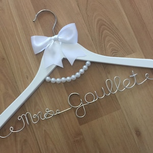 MRS AUDREY HANGER, gorgeous pearl necklace detail to compliment any classic dress for your wedding day pictures.