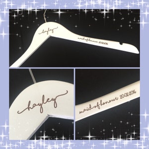 Love Story ETCHED custom coat hangers for the perfect wedding bridal party gift. Includes name, title and date etched into the wood. So nice