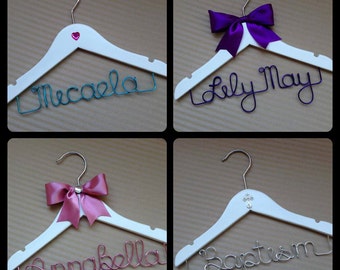 Adorable Children's coat hangers for weddings for flower girl or page boy or the perfect gifts for new borns, christenings and more.