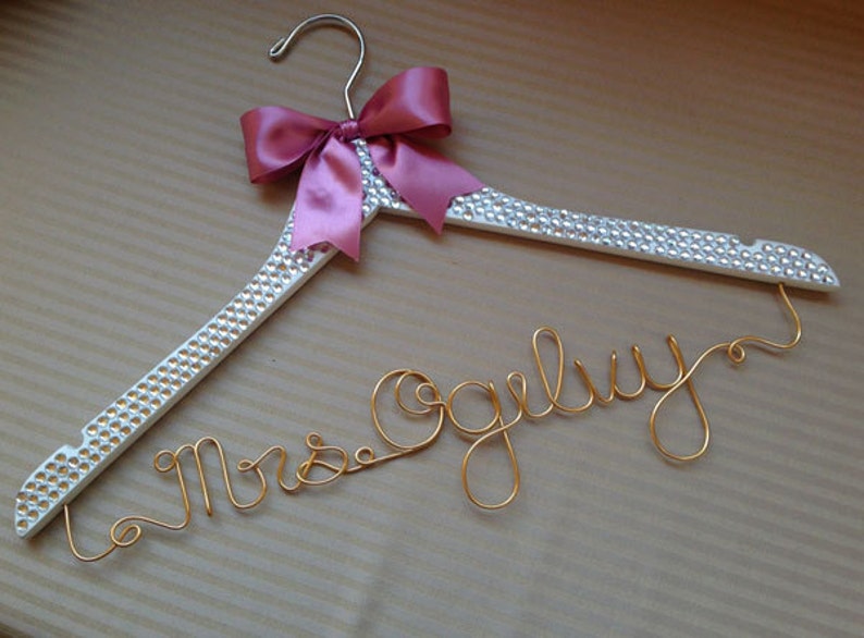 Stunning personalised clear crystal encrusted wedding hanger perfect for brides imagine how gorgeous your dress will look hanging on this