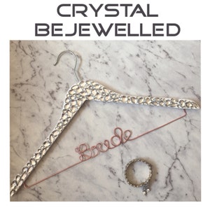 Gorgeous BEJEWELLED crystal hanger! Chunky glamorous jewels covering the hanger. Exclusively designed and created by us! We just love it!