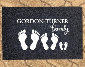 Family name with footprints doormat and custom names. Printed onto mat to last. Perfect gift for newlyweds, housewarming, birthdays, LGBTQ+