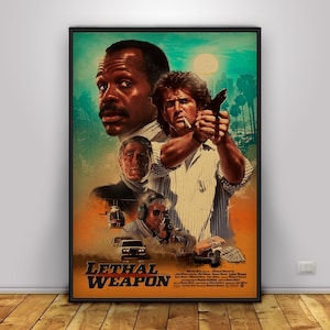 May include: A framed movie poster for Lethal Weapon featuring a large portrait of Danny Glover, a central figure of Mel Gibson holding a handgun, and a smaller portrait of Gary Busey. The background shows a helicopter and city skyline.