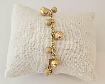 Bracelet plaqué or treize sphères en acier inoxydable