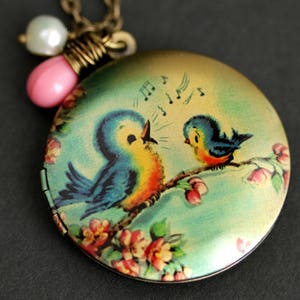 Singing Bird Locket Necklace. Cartoon Bird Necklace. Bluebird Necklace with Pink Teardrop and Fresh Water Pearl Charm. Bronze Locket. image 1