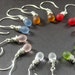 Irma Duron reviewed STERLING SILVER Wire Wrapped Clouded Glass Earrings - Set of Seven for the Price of Six. Handmade Jewelry.