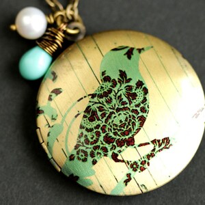 Turquoise Bird Locket Necklace. Filigree Bird Necklace with Aqua Blue Teardrop and Fresh Water Pearl Charm. Bronze Locket.