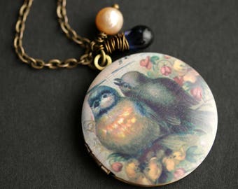 Brown Birds Locket Necklace. Bird Necklace with Dark Blue Teardrop and Peach Pearl Charm. Brown Necklace. Bronze Locket. Handmade Jewelry.