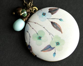 Flower Locket Necklace. Sage Green and Pale Blue Necklace with Aqua Blue Teardrop, Green Crystal, Brown Fresh Water Pearl. Bronze Locket