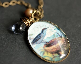 Blue Bird Necklace. Bird Nest Pendant with Dark Blue Teardrop and Fresh Water Pearl. Charm Necklace. Bluebird Necklace. Bronze Necklace.