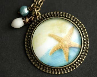 Beach Necklace. Starfish Pendant. Sea Star Necklace with White Coral Teardrop and Aqua Fresh Water Pearl. Beach Pendant. Bronze Necklace.