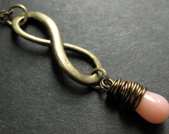 Infinity Necklace. Pink Coral Necklace. Teardrop Necklace Wire Wrapped in Bronze. Handmade Jewelry.