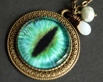 Dragon Eye Necklace. Cats Eye Pendant. Green and Teal Eye Necklace with White Teardrop and Fresh Water Pearl. Bronze Necklace.