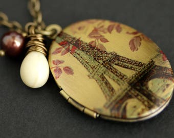 Eiffel Tower Locket Necklace. Oval Locket. Paris Necklace with Off White Teardrop and Dark Red Pearl Charm. Bronze Necklace. Photo Locket.