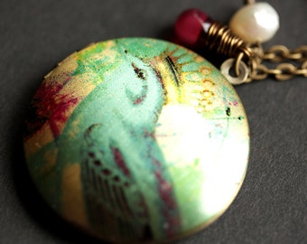 Blue Bird Locket Necklace. King Bird Necklace. Bronze Locket. Bluebird Necklace. Bronze Necklace with Raspberry Teardrop and Pearl Charm.