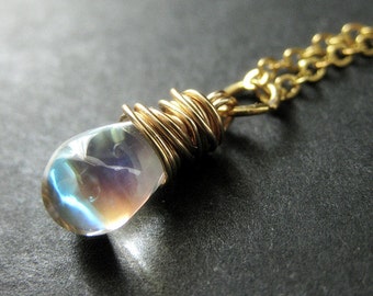 Opalescent Clear Necklace. Teardrop Necklace Wire Wrapped in Gold. Bridesmaid Jewelry. Handmade Necklace.