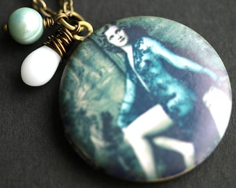 Vintage Lass Necklace. Pinup Girl Locket Necklace with White Teardrop and Aqua Blue Pearl Charm. Blue Necklace. Bronze Locket.