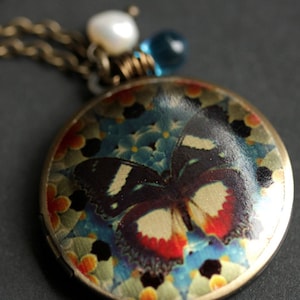 Butterfly Locket Necklace. Butterfly Necklace with Dark Blue Teardrop and Fresh Water Pearl. Bronze Locket. Handmade Jewelry.