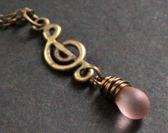 Music Necklace. Musical Note Necklace. Frosted Pink Teardrop Necklace. Treble Clef Necklace in Bronze. Handmade Jewellery.