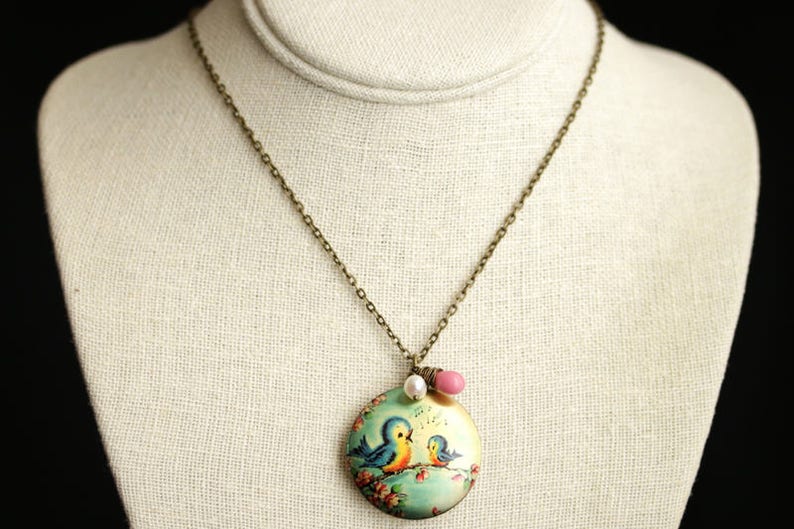 Singing Bird Locket Necklace. Cartoon Bird Necklace. Bluebird Necklace with Pink Teardrop and Fresh Water Pearl Charm. Bronze Locket. image 2