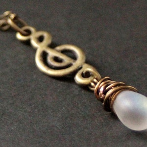 Musical Note Necklace. Treble Clef Necklace. Music Necklace. Frosted White Teardrop Necklace in Bronze. Handmade Jewellery.