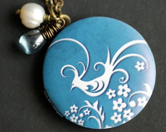 Dutch Bird Locket Necklace. Dutch Style Bird Necklace with Blue Teardrop and White Pearl Charm. Blue Necklace. Photo Locket. Bronze Locket.