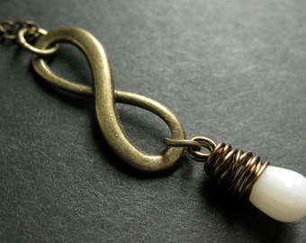 Infinity Necklace. White Coral Necklace. Teardrop Necklace Wire Wrapped in Bronze. Handmade Jewelry.