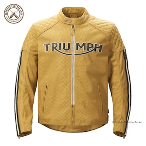 May include: A mustard yellow perforated leather jacket featuring a mandarin collar with two snap buttons, a central white zipper, and the black text TRIUMPH across the chest. The shoulders have a quilted pattern, and the sleeves feature black and white stripes.