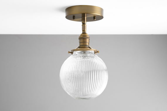 Prismatic flush clearance mount light