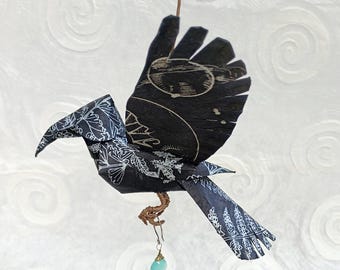 Paper 3D Baby crow with silver ferns and the cosmos