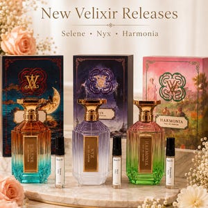 May include: Three glass perfume bottles labeled Selene, Nyx, and Harmonia, each with a matching sample vial. The bottles feature gold caps and gradient colors, displayed in front of their respective rectangular boxes with the text New Velixir Releases.