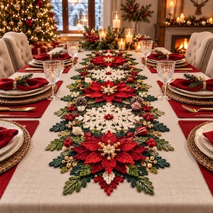 May include: A long, decorative table runner featuring a crochet design of red poinsettia flowers, white snowflakes, and green pine needles. The runner is accented with small gold beads, red berries, and miniature pinecones, creating a festive centerpiece.