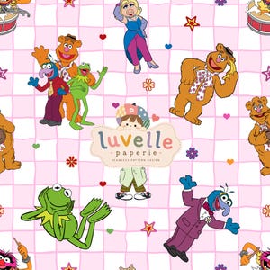 May include: A seamless pattern design featuring Muppet characters including Kermit the Frog, Miss Piggy, Fozzie Bear, and Gonzo on a light pink and white checkered background with small colorful stars, hearts, and flowers. The text luvelle paperie is centered.