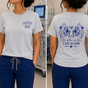 May include: A light gray short-sleeve t-shirt featuring the text Dialysis Tech on the front left chest. The back displays a blue floral graphic of two kidneys with a heart and the text We filter so life CAN FLOW in blue lettering.