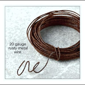 May include: A roll of 20 gauge rusty metal wire. The wire is brown and has a rough texture.