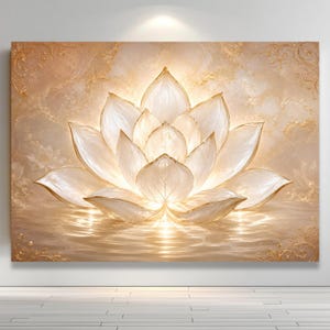 May include: A rectangular wall art print featuring a large, luminous white lotus flower centered in the composition. The petals have delicate gold edges, and the flower rests on a shimmering, reflective golden water surface with ornate gold filigree.