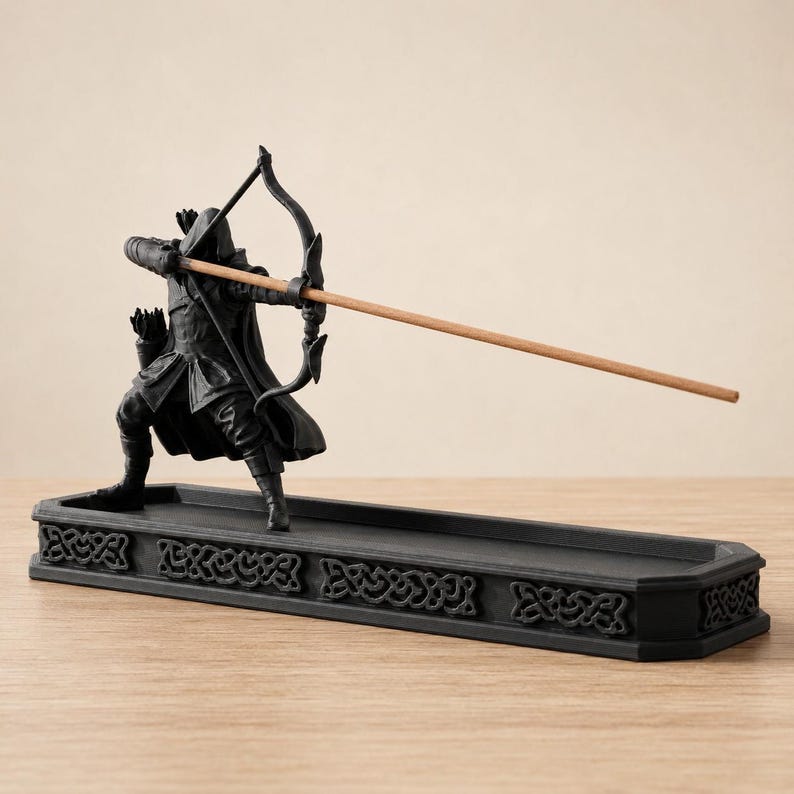 Unlit black fantasy archer incense holder with bow, quiver, incense-stick arrow, and long Celtic-style ash tray