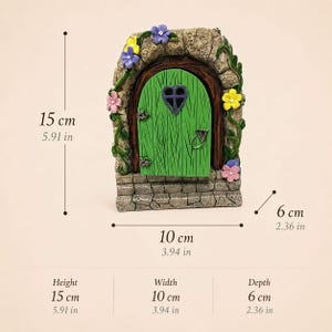 May include: A decorative arched door with a green finish, a heart-shaped window, and stone-textured frame adorned with colorful flowers. It measures 5.91 inches in height, 3.94 inches in width, and 2.36 inches in depth, as indicated by the text.