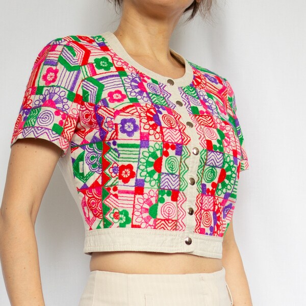 Adorable vintage Lucie Linden linen cropped top cardigan with colorful geometric patterns and buttons down the front