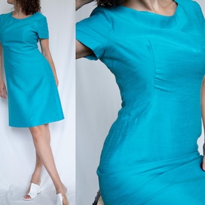 Vintage Kitty Copeland turquoise short sleeve midi sheath dress from 60s with fitted bodice and waistline / Size Medium