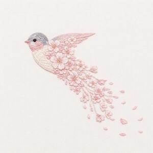 Può includere: Un ricamo che raffigura un uccello con la testa grigia e il corpo che sfuma in una scia di fiori di ciliegio rosa chiaro. L'uccello è rappresentato in volo, con il motivo floreale che si estende all'indietro come una coda di petali.