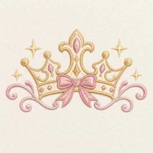 May include: An embroidered design featuring a gold crown with pink accents, a central pink bow, and four small gold stars. The crown is flanked by symmetrical pink scrollwork on both sides, all rendered in detailed thread work on a light fabric.